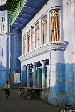 Blue facade in Pushkar, alley, balcony, blue, boy, carriage, columns, evening light, facade, India